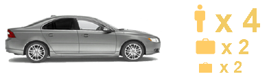 A silver saloon, side view.